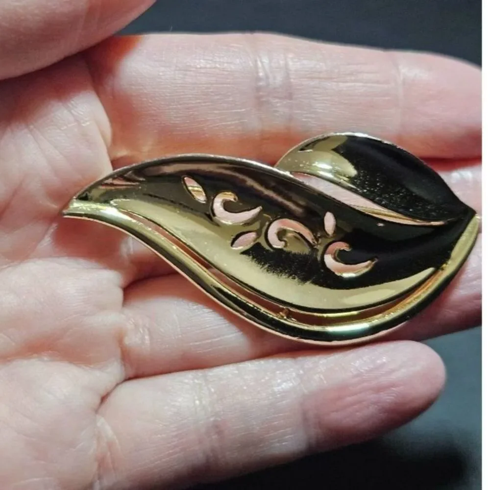 AJC vintage gold tone brooch